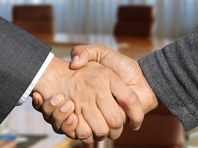 Handshake on successful financing